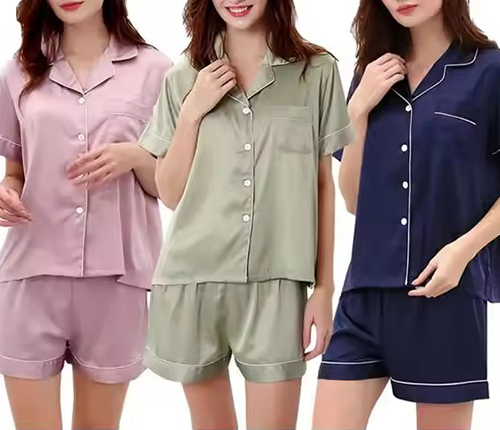 Model wearing a white lightweight crinkle-cotton short-sleeve and shorts set