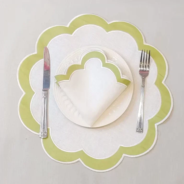 Scalloped and hemstitch linen napkin edges in white and dusty pink
